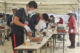 Start of gathering volunteers for work involving peeling shikkui plaster off the roof tiles.